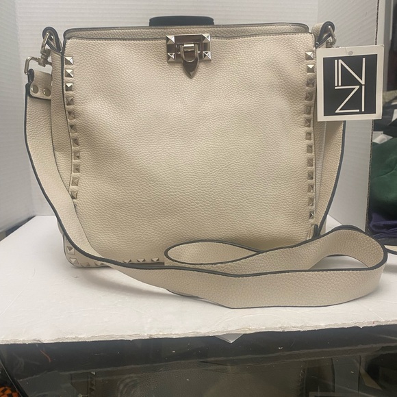 Chic Cream Crossbody Bag with Stud Details by Inzi - Picture 1 of 7